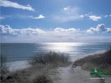 Computer screen wallpaper: A view of the beach near Boderne on Danish island Bornholm.