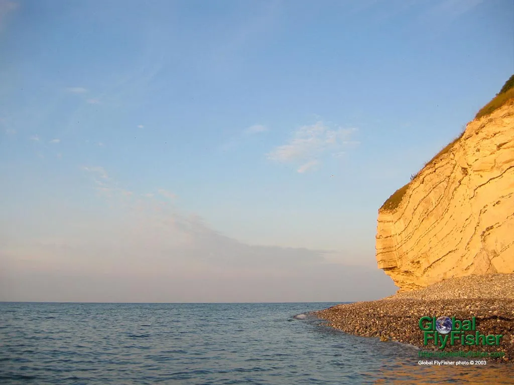 Computer screen wallpaper: Early morning sunlight on the cliffs.